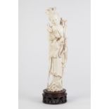 CHINESE EARLY TWENTIETH CENTURY CARVED ONE PIECE IVORY FIGURE of Kwan Yin, the of compassion