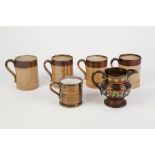 FOUR NINETEENTH CENTURY DOULTON AND CO. LTD. LAMBETH FAWN AND BROWN STONE WARE HALF PINT MUGS,