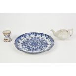 ANTIQUE BLUE AND WHITE FAIENCE PLATE painted with a floral and foliate pattern and border, 9" dia;