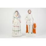 NINETEENTH CENTURY STAFFORDSHIRE LARGE POTTERY FIGURES OF THE 'PRINCE OF WALES' AND THE DUCHESS OF