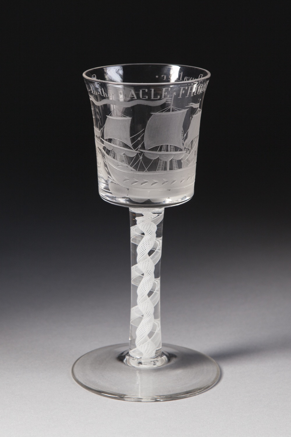 MODERN REPRODUCTION OF AN 18th CENTURY PRIVATEER WINE GLASS FOR THE EAGLE FRIGATE, the slightly