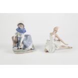 NAO PORCELAIN GROUP, modelled as a young girl with kitten, 7 ¾" (19.7cm) high TOGETHER WITH A FIGURE