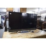 SONY BRAVIA FLAT SCREEN TELEVISION WITH REMOTE CONTROL
