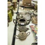 AN ELECTROPLATE CIRCULAR SALVER, ON FEET, A THREE PIECE EPNS TEA SET, TOAST RACK VARIOUS CUTLERY