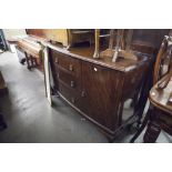 CIRCA 1930's MAHOGANY BOW FRONT SIDEBOARD, WITH LEDGE BACK AND CABRIOLE LEGS