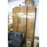 A VICTORIAN WALNUT BEDROOM SUITE COMPRISING; DRESSING TABLE WITH SHAPED TRIPLE MIRROR AND WARDROBE