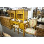 A 'WINDSOR' SOLID OAK KNEEHOLE DRESSING TABLE, A PAIR OF MATCHING BEDSIDE CABINETS, A STOOL AND A