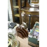 A SMALL WALNUTWOOD LETTER RACK, A BENARES BRASS GLOBE AND SHAFT SHAPED VASE, A BLACK AND METAL