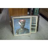 AN OBLONG OAK FRAMED WALL MIRROR AND A COLOUR PRINT OF AN INDIAN WOMAN, ANOTHER OF AN AFRICAN AND