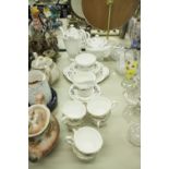 TWENTY THREE PIECE PARAGON BRIDAL ROSE PATTERN CHINA TEA SERVICE FOR SIX PERSONS, including teapot