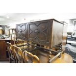 A DARK OAK SIDEBOARD CIRCA 1930's WITH TWO DOOR CUPBOARD 'X' BEAD DETAIL, PIERCED FLORAL PEDIMENT,