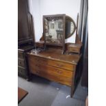 A MAHOGANY AND INLAY BEDROOM SUITE COMPRISING A DRESSING TABLE WITH CENTRAL SWING MIRROR, THE BASE