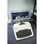 OLYMPIA TYPEWRITER AND COVER, AND A SACAR HARD CARRYING CASE (2)