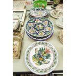 ELEVEN CONTINENTAL POTTERY PLATES