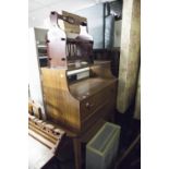 A WOOD EFFECT DROP LEAF KITCHEN TABLE, TV CABINET, OPEN BOOKCASE AND A MAGAZINE RACK (4)