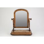 VICTORIAN MAHOGANY TOILET MIRROR, with milestone plate and moulded rounded oblong base (a/f)