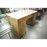 A SATINWOOD PEDESTAL DRESSING TABLE, WITH THREE DRAWERS OVER TWO CUPBOARDS, WHITE MARBLE TOP, 4'