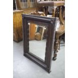 NINETEENTH CENTURY LARGE RECTANGULAR WALL MIRROR, IN HEAVY BOBBIN TURNED STAINED WOODEN FRAME, 3'