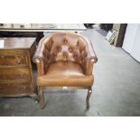 BROWN LEATHER TUB CHAIR WITH BUTTON BACK
