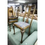 A SET OF FOUR QUEEN ANNE STYLE DINING CHAIRS