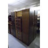 A BEDSIDE CHEST OF THREE DRAWERS AND TWO MATCHING SMALL WARDROBES