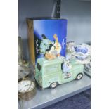 A WALLACE AND GROMMIT VAN MONEY BOX IN ORIGINAL BOX