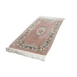 HEAVY QUALITY WASHED CHINESE ALL-WOOL RUG with Aubusson embossed floral and off-white centre