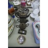 AN ELECTROPLATE CIRCULAR SALVER, ON FEET, A THREE PIECE EPNS TEA SET, TOAST RACK VARIOUS CUTLERY