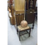 ANTIQUE RUSTIC OAK SINGLE CHAIR WITH LATH BACK AND DROP IN RUSH SEAT AND AN ANTIQUE BED WARMING