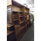 TWO TEAK SHELVING UNITS WITH CUPBOARD BASES, EACH 3'4" WIDE, 6' HIGH