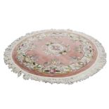 WASHED CHINESE ALL-WOOL CIRCULAR RUG of Aubusson design with off-white and floral embossed medallion