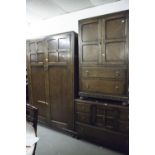 AN OAK THREE PIECE BEDROOM SUITE, COMPRISING; A TALLBOY, A DRESSING TABLE, WITH SHAPED MIRROR OVER