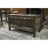 SMALL GOOD QUALITY SEVENTEENTH CENTURY STYLE CARVED OAK BLANKET BOX WITH FRAMED TWO PANEL TOP