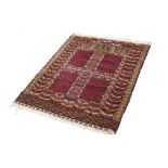 A FINELY KNOTTED AND INTRICATELY PATTERNED TURKOMAN PRAYER RUG, with four panel field with