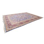 KASHMIR FINELY KNOTTED LARGE CARPET, with centre floral medallion and radiating smaller