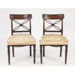 SET OF FOUR LATE GEORGIAN CARVED MAHOGANY SINGLE DINING CHAIRS, each with moulded top rail and fancy