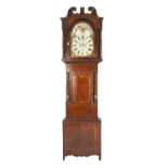 EARLY NINETEENTH CENTURY FLAME CUT AND CROSSBANDED MAHOGANY LONG CASE CLOCK, with rolling moonphase,