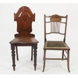 VICTORIAN CARVED MAHOGANY HALL CHAIR, the shield shaped back with central cartouche, above a