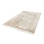 WASHED CHINESE CARPET OF AUBUSSON DESIGN, with large oval centre medallion on a mushroom and