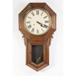 EARLY TWENTIETH CENTURY ANSONIA DROP DIAL WALL CLOCK, of typical form with 11" Roman dial and spring