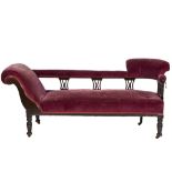 EDWARDIAN DARK STAINED MAHOGANY CHAISE LONGUE, of typical form with scroll end, galleried back and