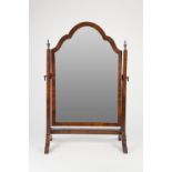 MAHOGANY CHEVAL TOILET MIRROR, the swing mirror with shaped arched top, the stand with metal urn