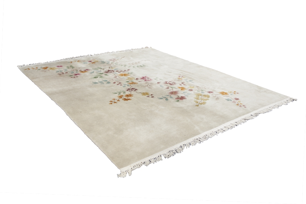 WASHED CHINESE MUSHROOM COLOURED CARPET, decorated in multi colours to the full length with a