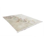WASHED CHINESE MUSHROOM COLOURED CARPET, decorated in multi colours to the full length with a