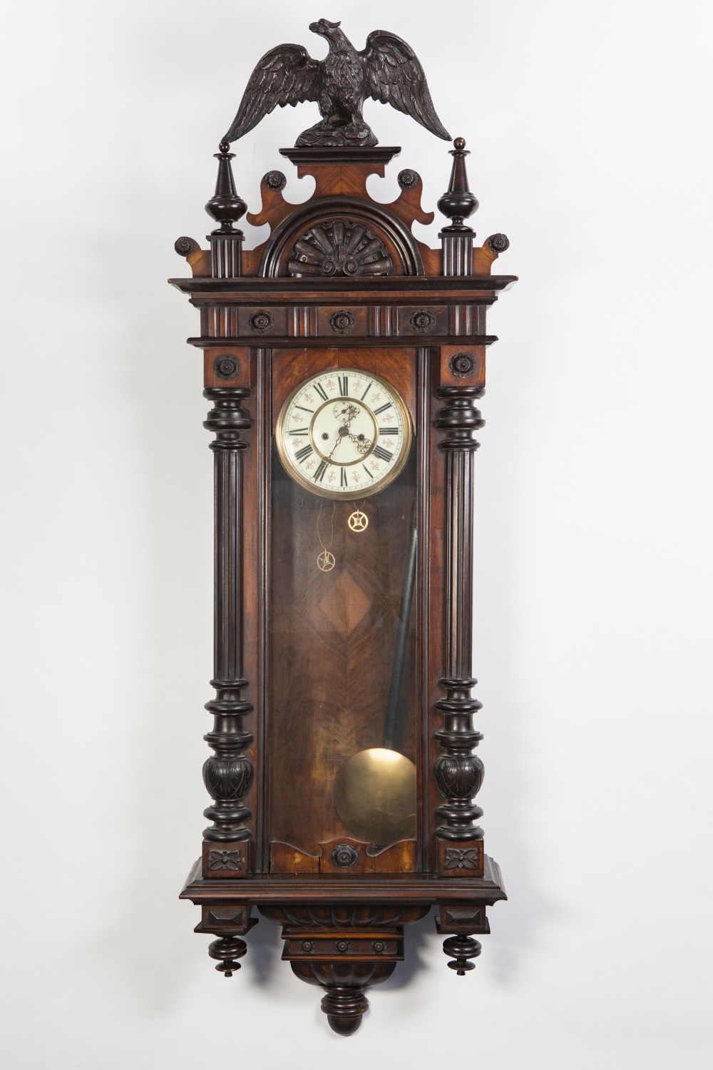 LATE NINETEENTH/ EARLY TWENTIETH CENTURY WALNUT VIENNA WALL CLOCK, of typical form with a subsidiary