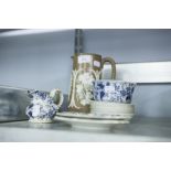 VICTORIAN DRAB WARE JUG, EMBOSSED IN WHITE WITH FRUITING VINES AND NINE PIECES OF BLUE AND WHITE