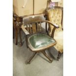 CIRCA 1920's OAK TUB SHAPE DESK CHAIR, WITH SWIVEL AND TILT ACTION, QUARTETTE SUPPORTS