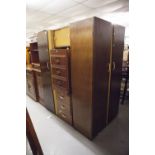 A BEDSIDE CHEST OF THREE DRAWERS AND TWO MATCHING SMALL WARDROBES