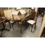 A WALNUTWOOD QUEEN ANNE STYLE DINING ROOM TABLE AND SIX SINGLE CHAIRS