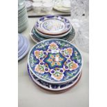 ELEVEN CONTINENTAL POTTERY PLATES